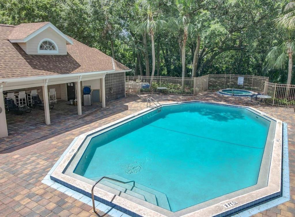 655 Magic Court, Unit 188 Altamonte Springs, FL 32714 - Photo 31 of 33 a view of a backyard with sitting area and slide