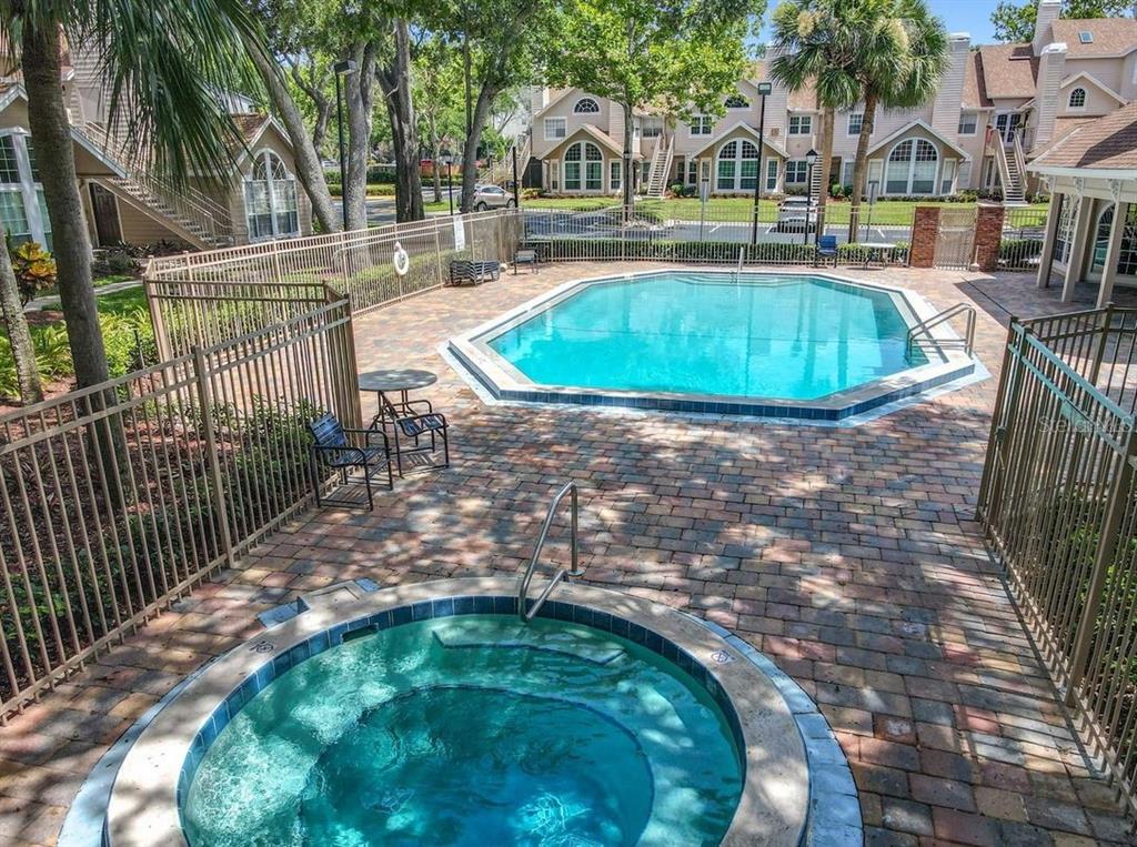 655 Magic Court, Unit 188 Altamonte Springs, FL 32714 - Photo 32 of 33 a backyard of a house with outdoor seating