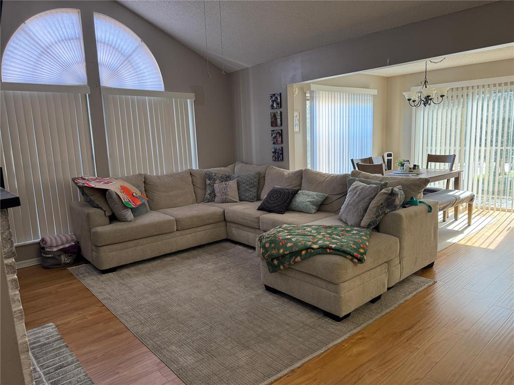 655 Magic Court, Unit 188 Altamonte Springs, FL 32714 - Photo 9 of 33 a living room with furniture and a large window