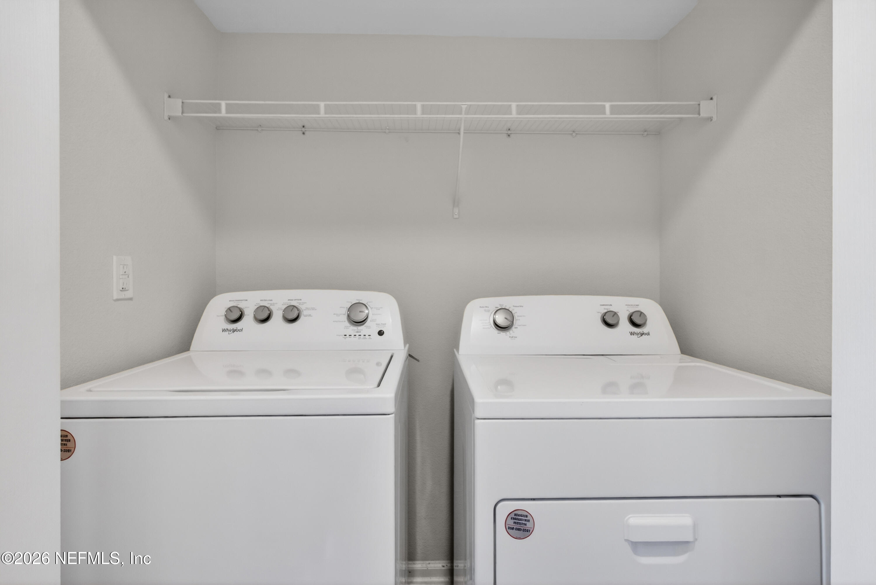 8210 Larose Road Jacksonville, FL 32211 - Photo 29 of 38 a utility room with dryer and washer