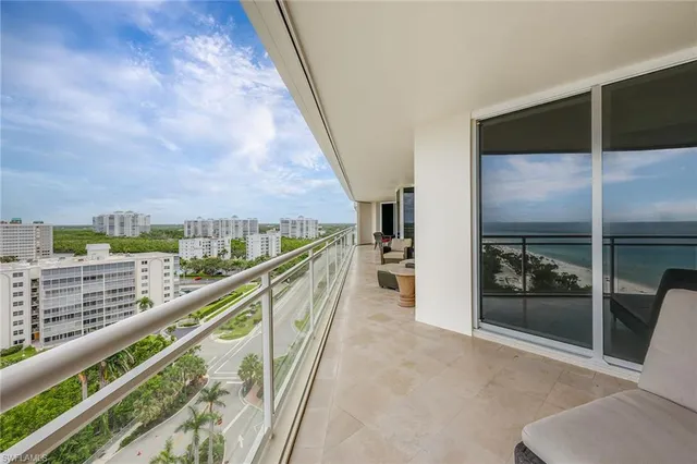 a view of balcony with furniture