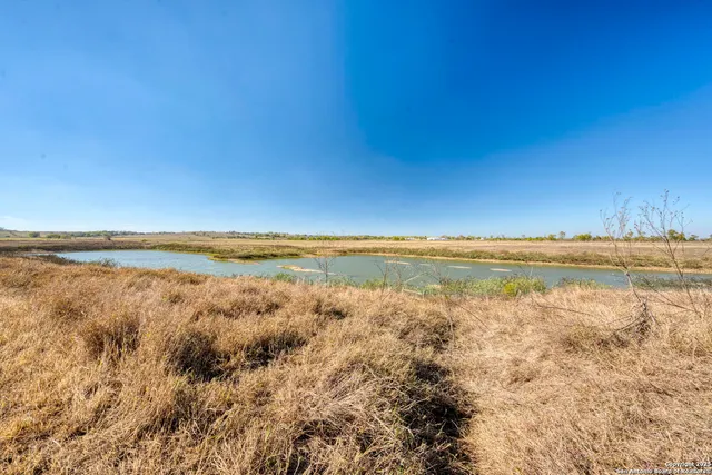 a view of a lake with outdoor space