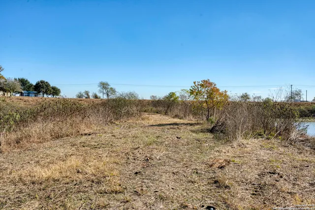 an aerial view of beach and city