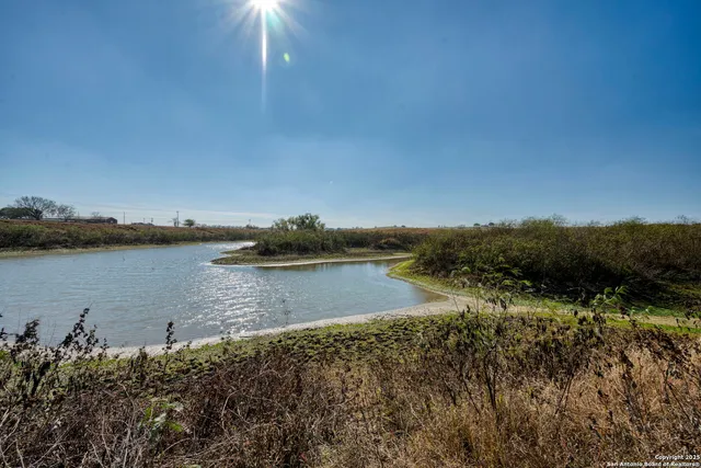 a view of a lake with a beach