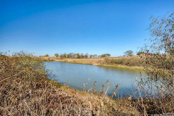 a view of a lake with outdoor space