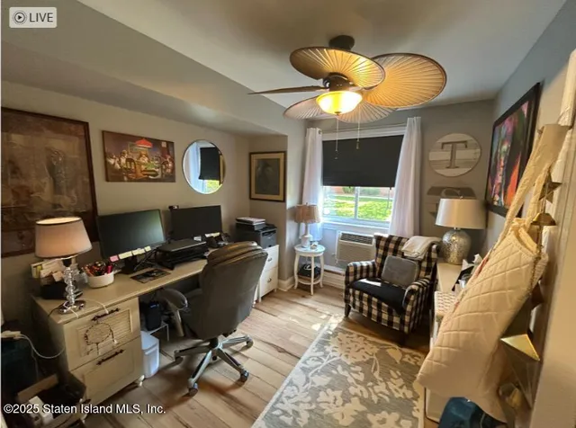 a workspace with furniture and a window