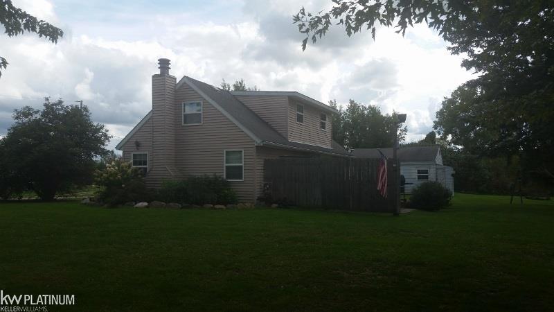 west side home with deck and patio door off dining room