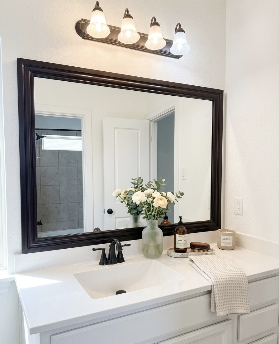 28627 Rolling Ridge Drive Katy, TX 77494 - Photo 32 of 44 a bathroom with a sink and a mirror