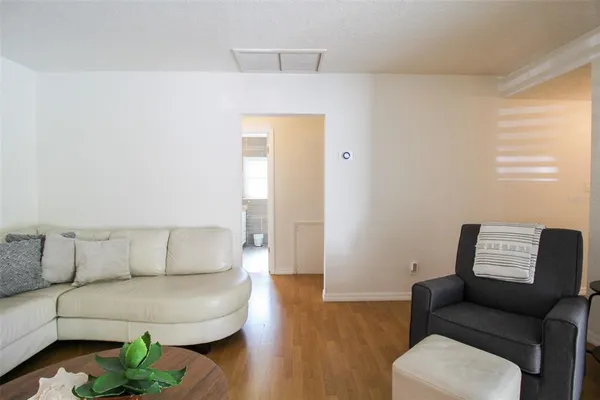 a living room with furniture and a couch
