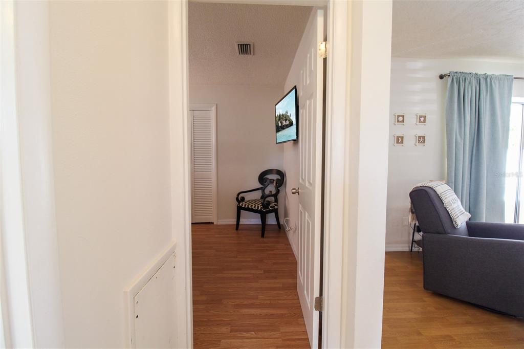 3223 Rowena Street Sarasota, FL 34231 - Photo 19 of 51 a view of a livingroom with couch and a window