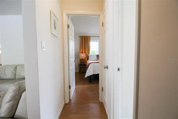 a view of a bedroom from a hallway