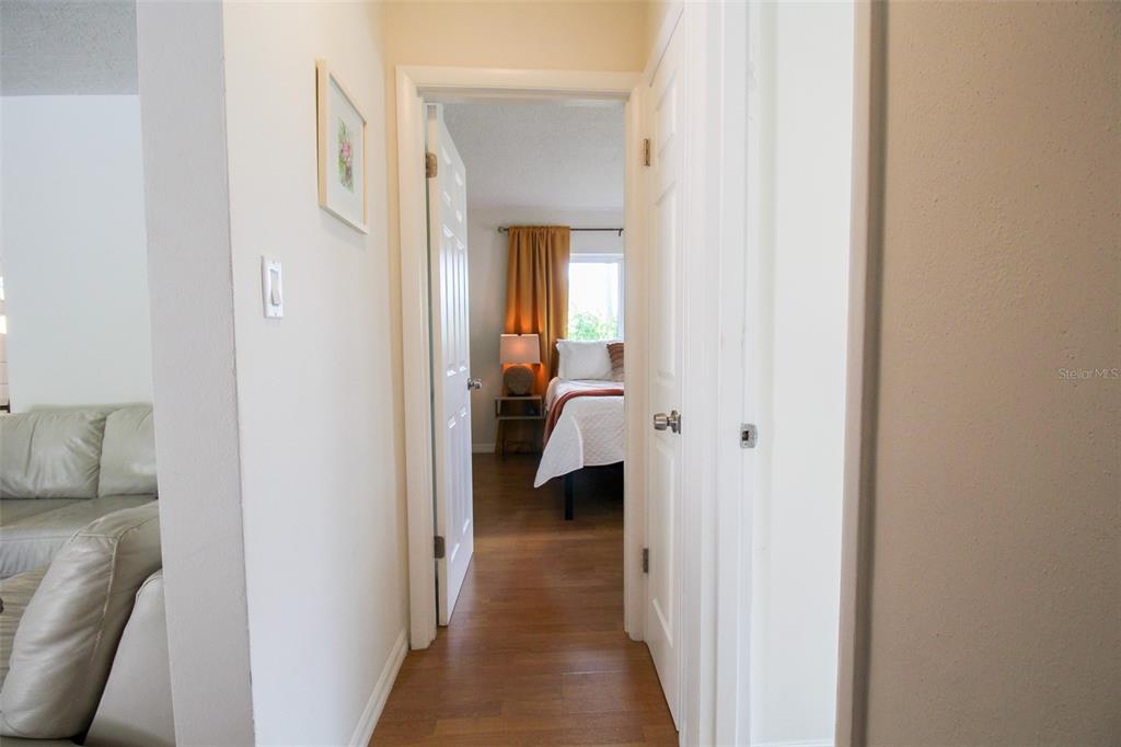 3223 Rowena Street Sarasota, FL 34231 - Photo 23 of 51 a view of a bedroom from a hallway