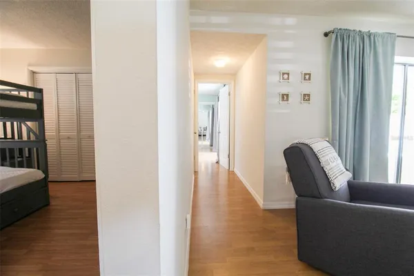 a view of livingroom with furniture and wooden floor
