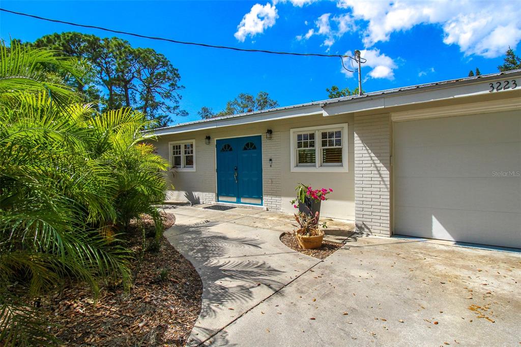 3223 Rowena Street Sarasota, FL 34231 - Photo 4 of 51 a view of a backyard