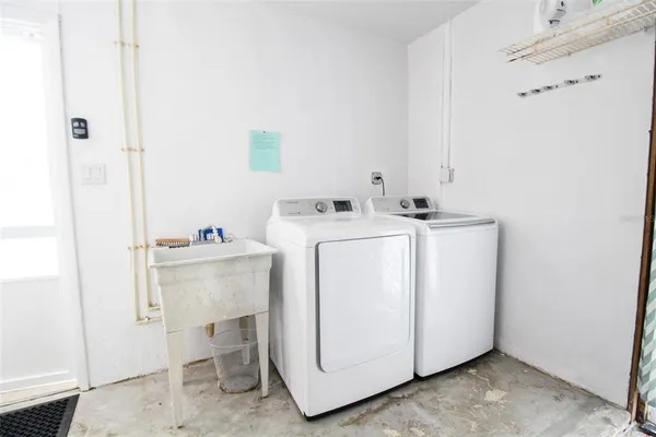 a view of a swimming pool and a yard