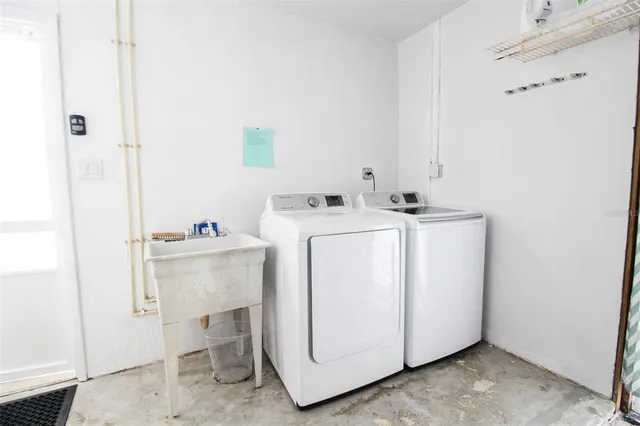 a view of a swimming pool and a yard