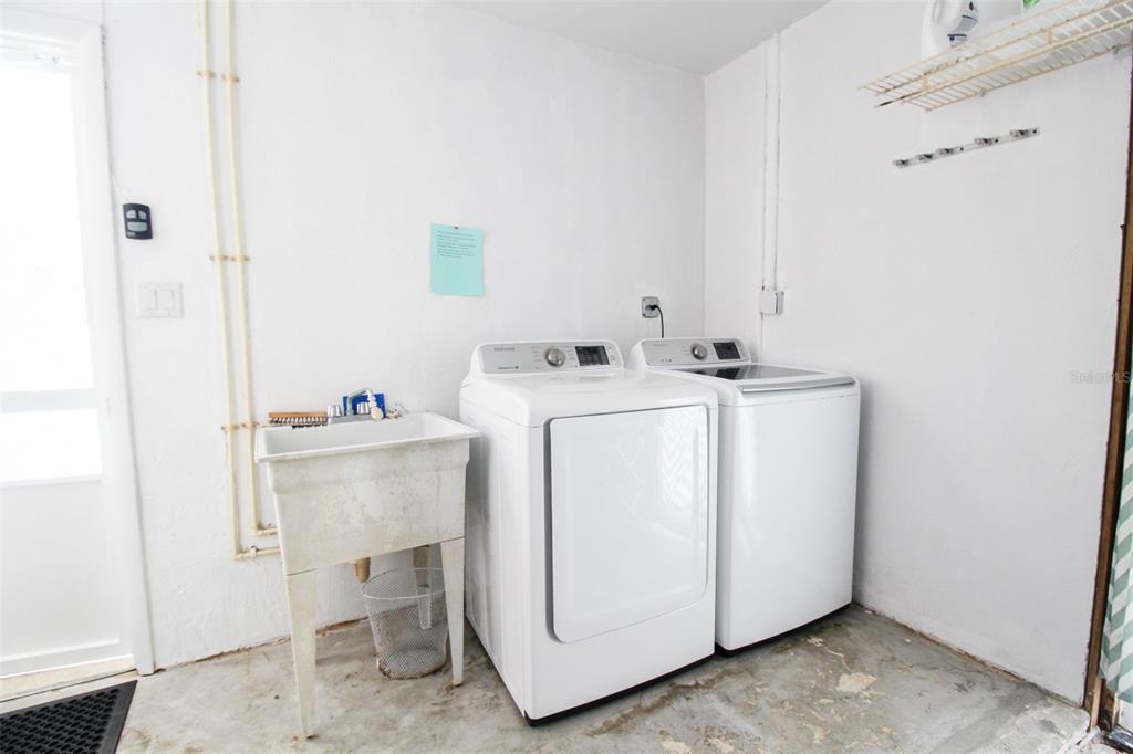 3223 Rowena Street Sarasota, FL 34231 - Photo 41 of 51 a utility room with dryer and washer