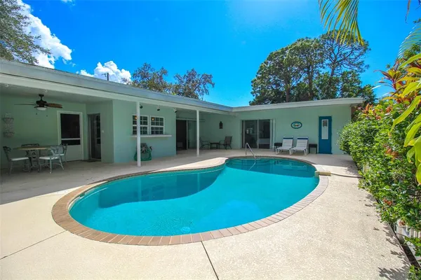 a view of balcony with wooden floor