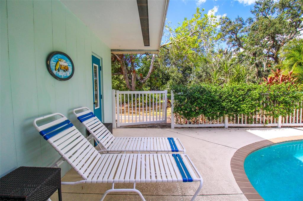 3223 Rowena Street Sarasota, FL 34231 - Photo 46 of 51 a view of balcony with wooden floor