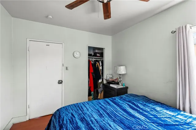 a view of a livingroom with wooden floor and closet