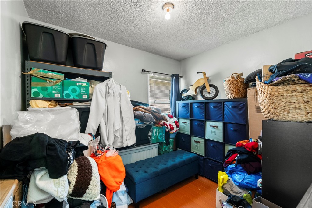 908 West 132nd Street Compton, CA 90222 - Photo 19 of 36 a living room with furniture and a potted plant