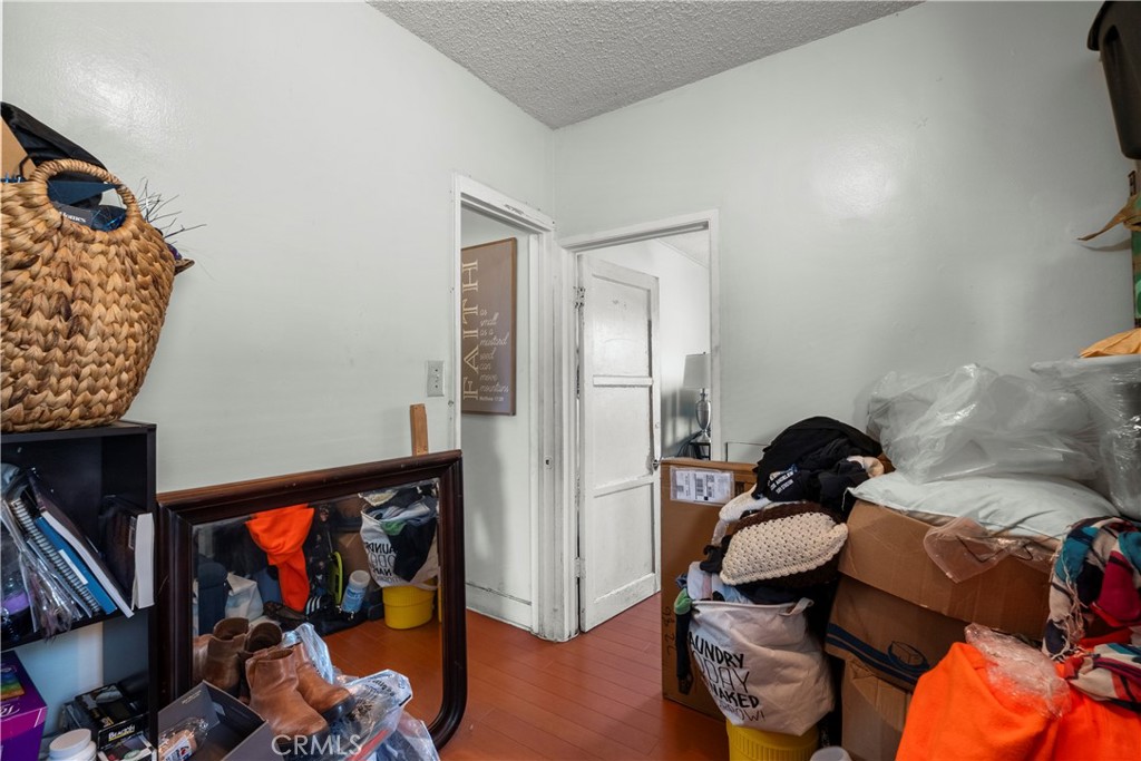908 West 132nd Street Compton, CA 90222 - Photo 20 of 36 a living room with furniture a rug and a window