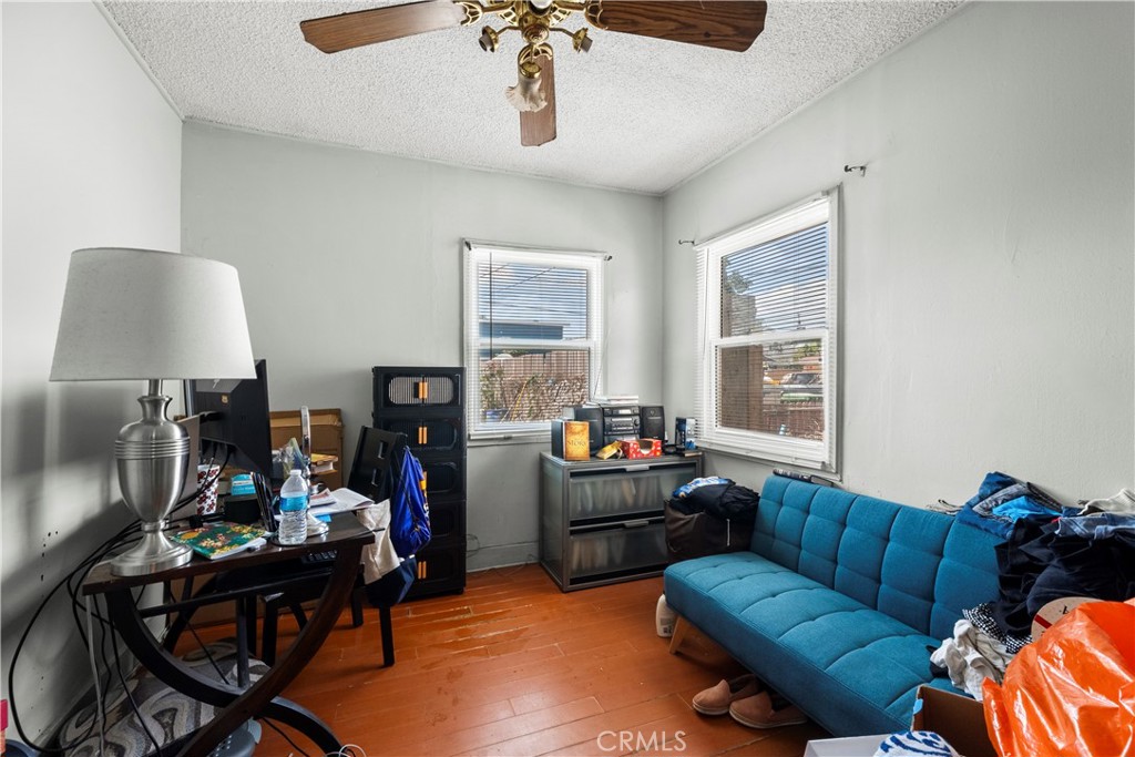 908 West 132nd Street Compton, CA 90222 - Photo 21 of 36 a living room with furniture and a window