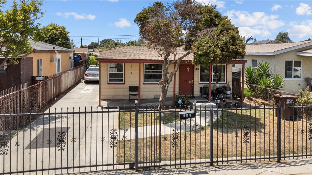 908 West 132nd Street Compton, CA 90222 - Photo 33 of 36 front view of house with a small yard