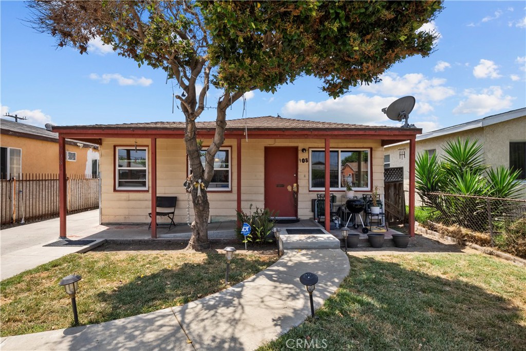 908 West 132nd Street Compton, CA 90222 - Photo 36 of 36 a front view of a house with porch