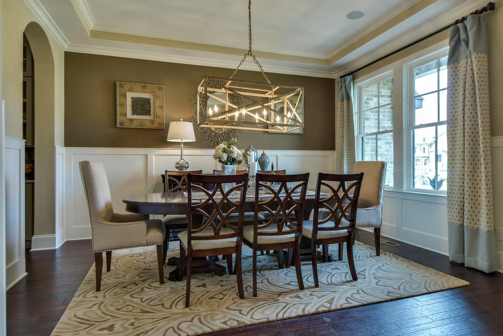 Formal dining room.  Choose your own colors and features as this is a model home built in another community.  Must hurry to have ability to choose colors, flooring and cabinetry