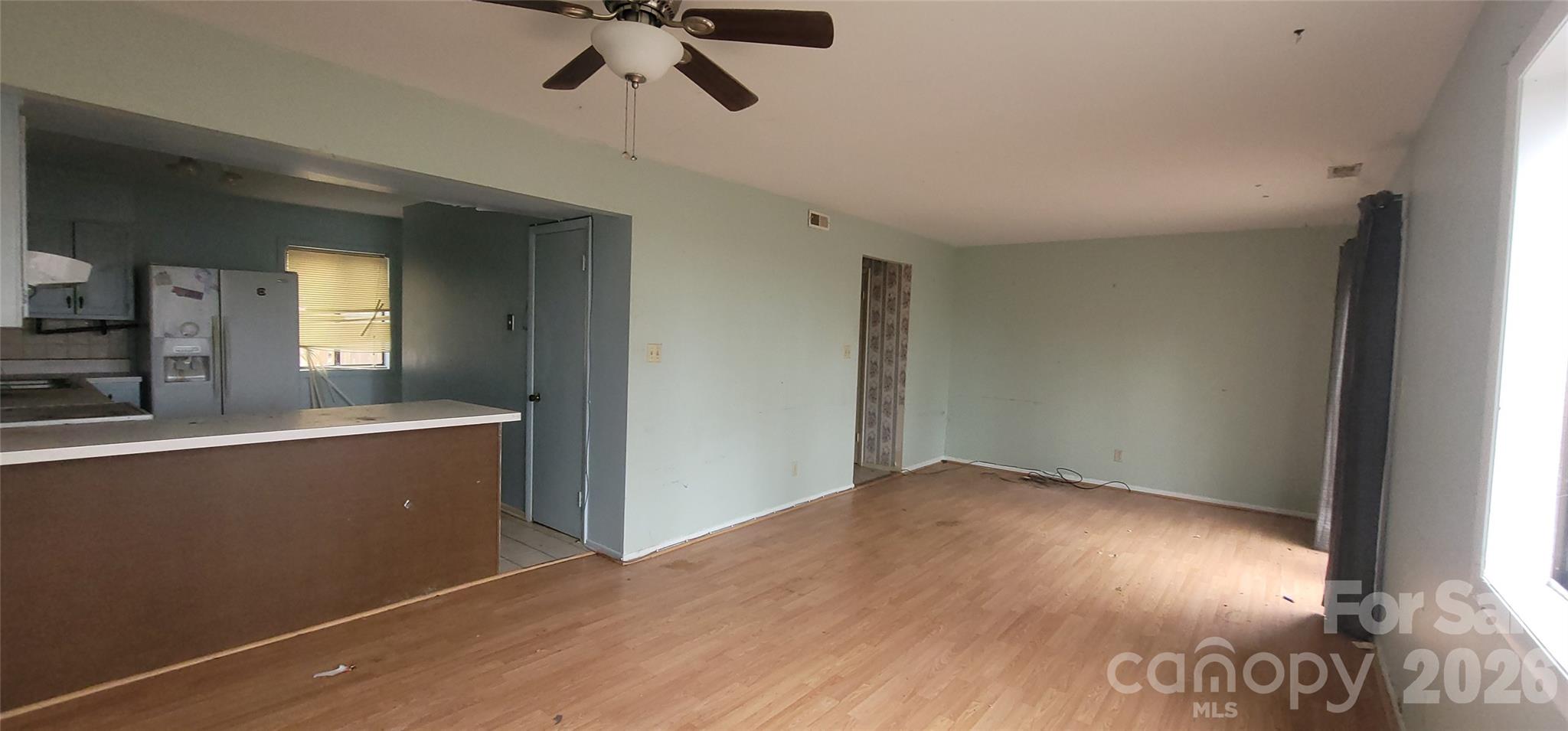 7882 Kinglet Road Connelly Springs, NC 28612 - Photo 14 of 40 a view of a room with wooden floor and staircase