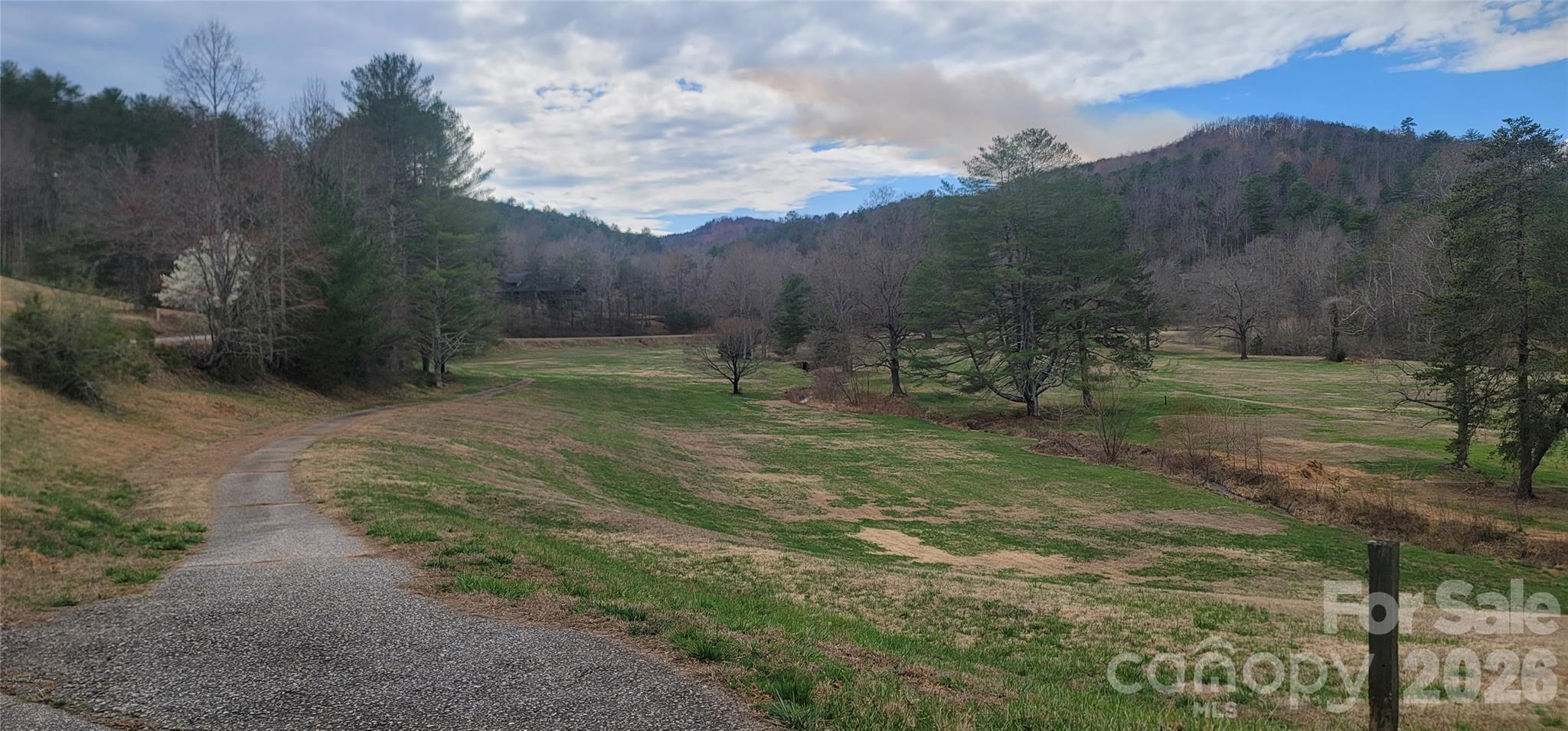 7882 Kinglet Road Connelly Springs, NC 28612 - Photo 2 of 40 a big yard with lots of green space