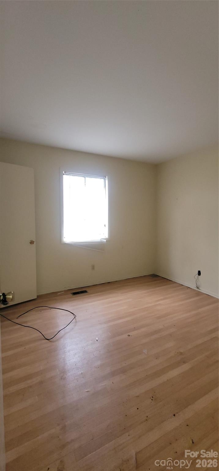 7882 Kinglet Road Connelly Springs, NC 28612 - Photo 24 of 40 a view of an empty room with a window