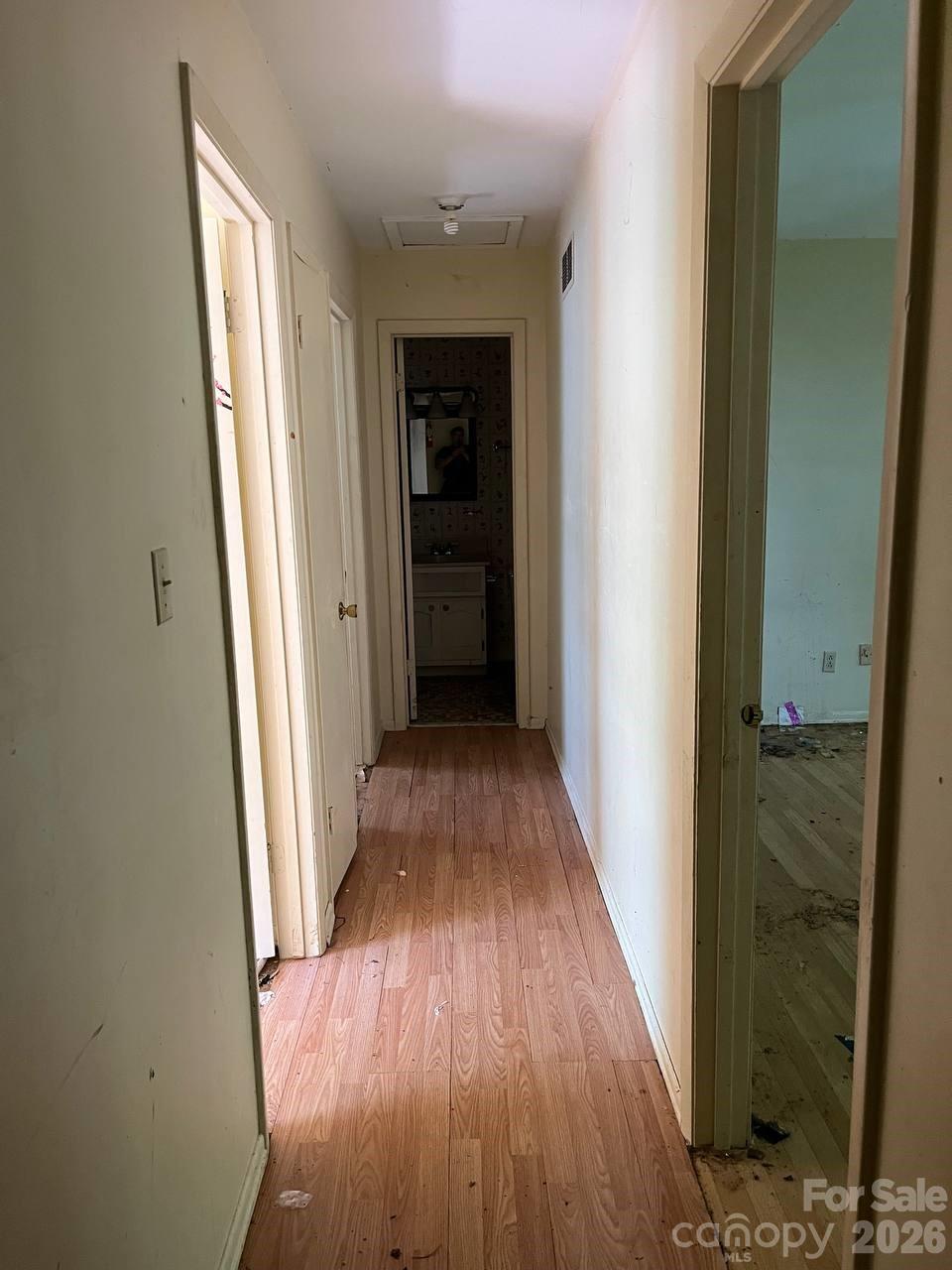 7882 Kinglet Road Connelly Springs, NC 28612 - Photo 4 of 40 a view of a hallway with wooden floor