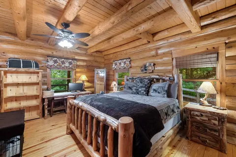 a bed room with a bed and a window