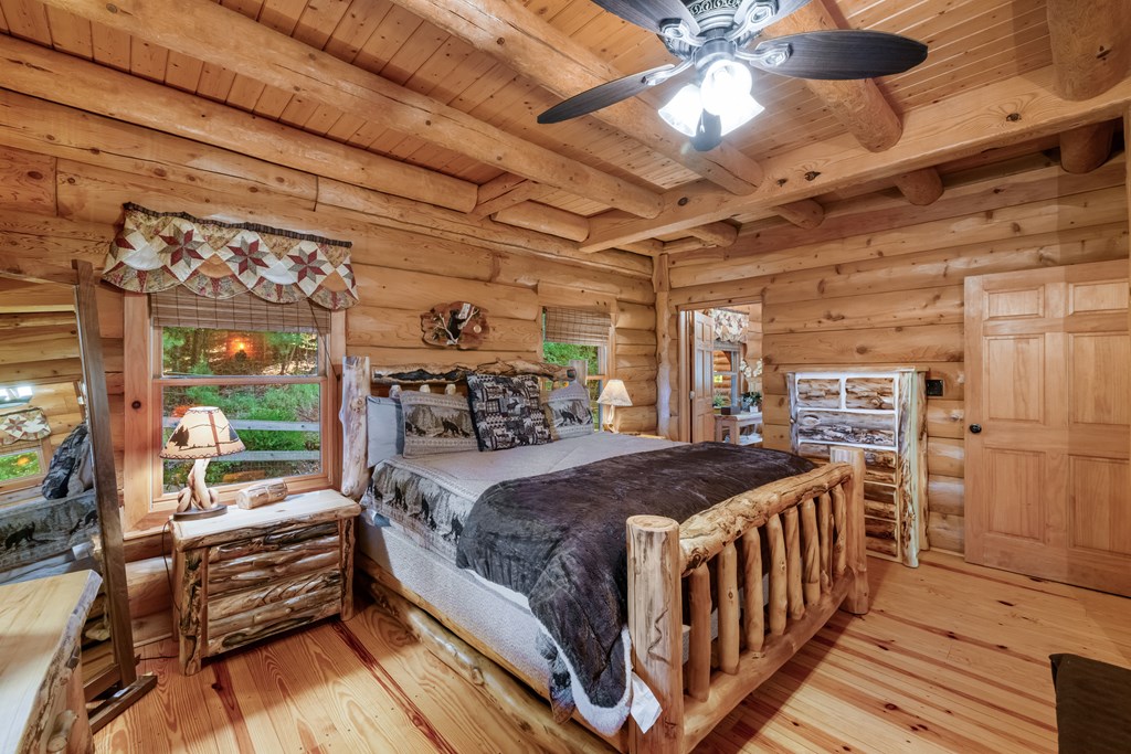 209 Stavanger Road Morganton, GA 30560 - Photo 13 of 39 a bed room with a bed and a table