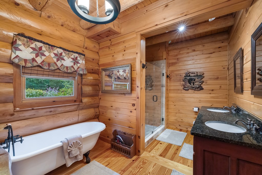 209 Stavanger Road Morganton, GA 30560 - Photo 15 of 39 a bathroom with a sink a toilet and shower