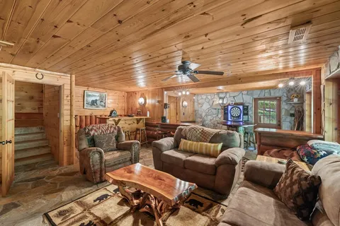 a media room with lots of chairs and a projector