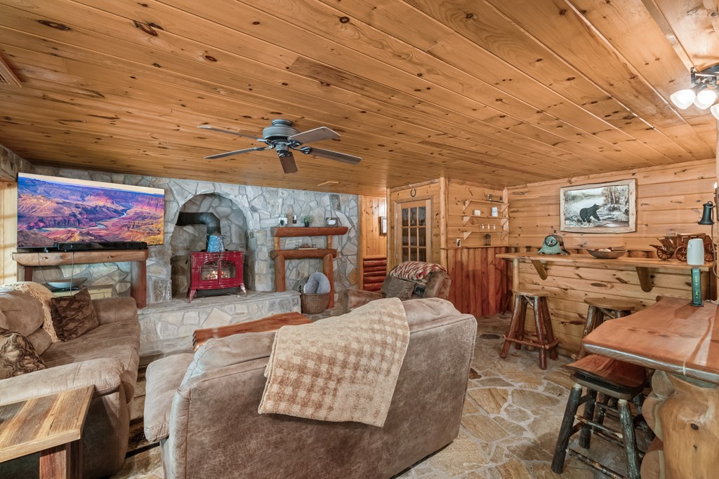 209 Stavanger Road Morganton, GA 30560 - Photo 23 of 39 a view of a livingroom with furniture and a flat screen tv