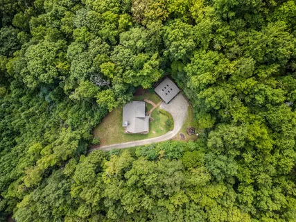 a house view with a backyard space