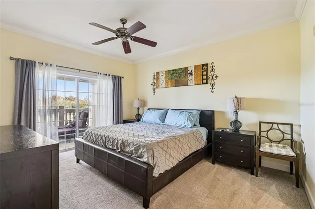 a bedroom with two beds and painting on the wall