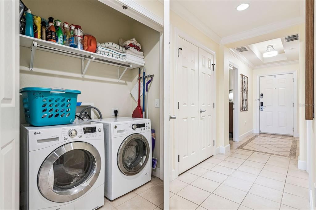 1356 Centre Ct Ridge Drive, Unit 202 Reunion, FL 34747 - Photo 31 of 67 a view of entryway with washer and dryer