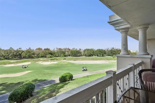 an aerial view of residential houses with outdoor space and river