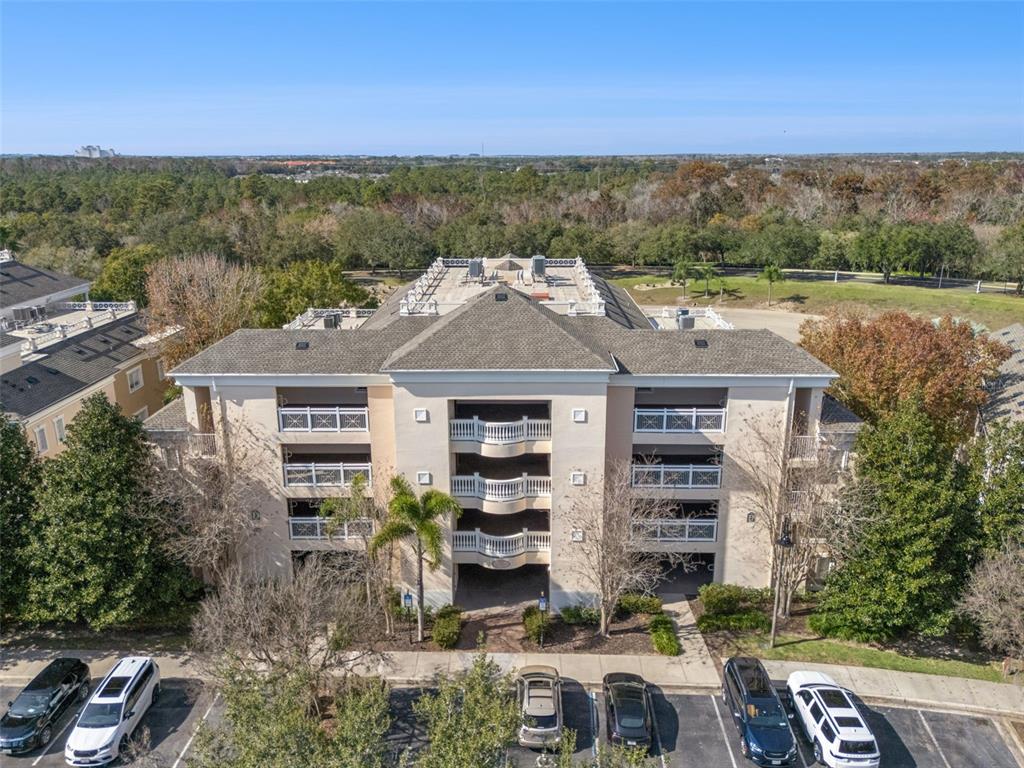 1356 Centre Ct Ridge Drive, Unit 202 Reunion, FL 34747 - Photo 45 of 67 an aerial view of a house with a yard