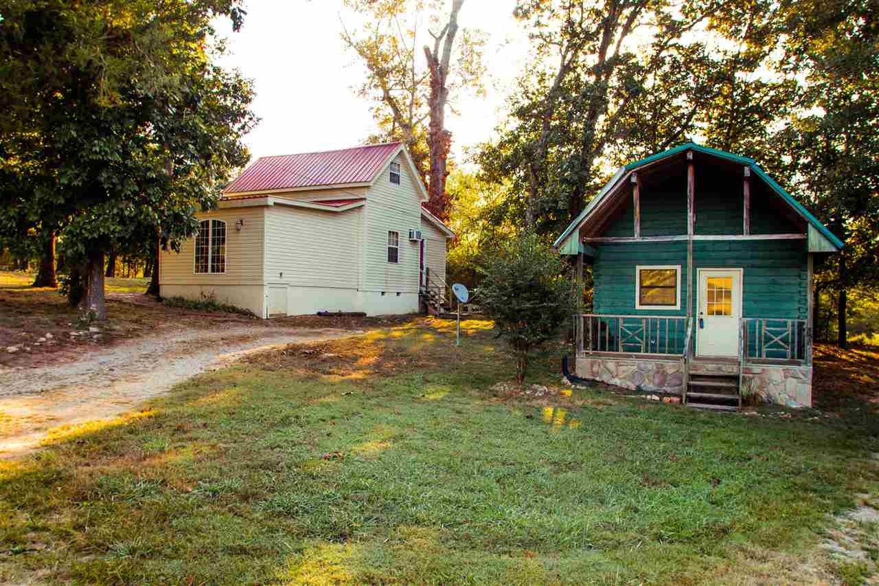 560 Reynolds Bridge Road Ocoee, TN 37361 - Photo 20 of 32 a front view of a house with a yard