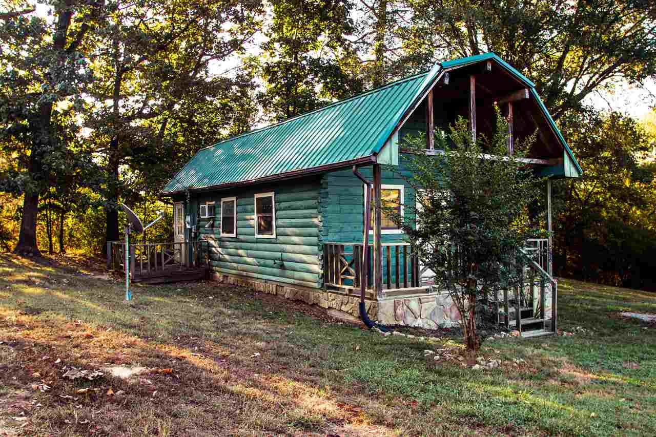 560 Reynolds Bridge Road Ocoee, TN 37361 - Photo 22 of 32 a view of a house with a yard