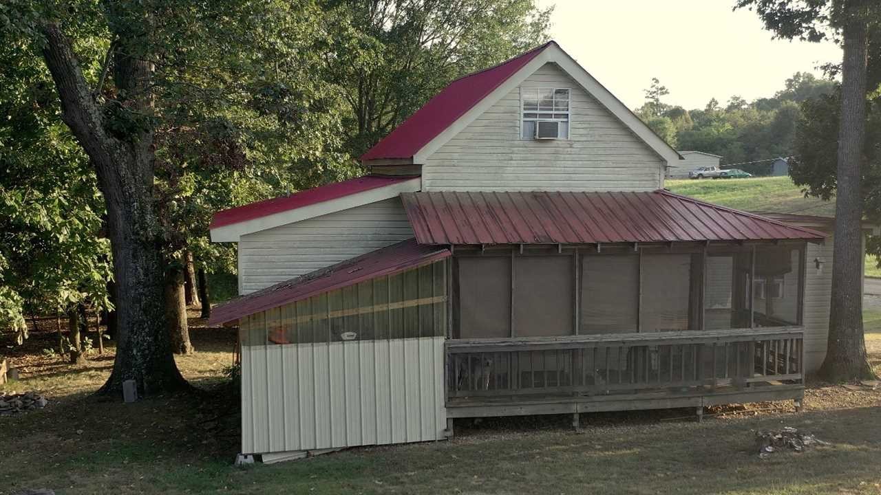 560 Reynolds Bridge Road Ocoee, TN 37361 - Photo 3 of 32 a view of barn with a small yard
