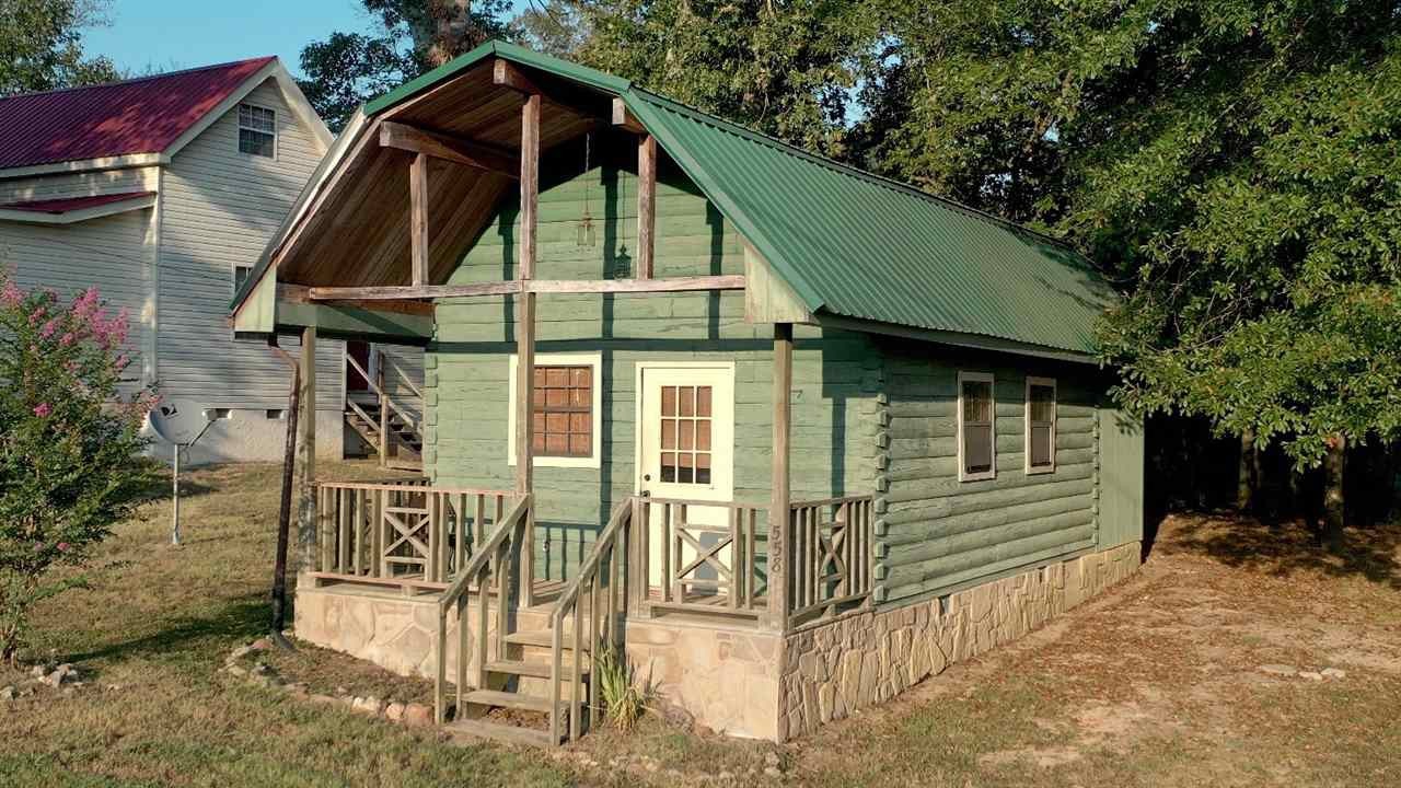 560 Reynolds Bridge Road Ocoee, TN 37361 - Photo 5 of 32 a front view of a house with a yard