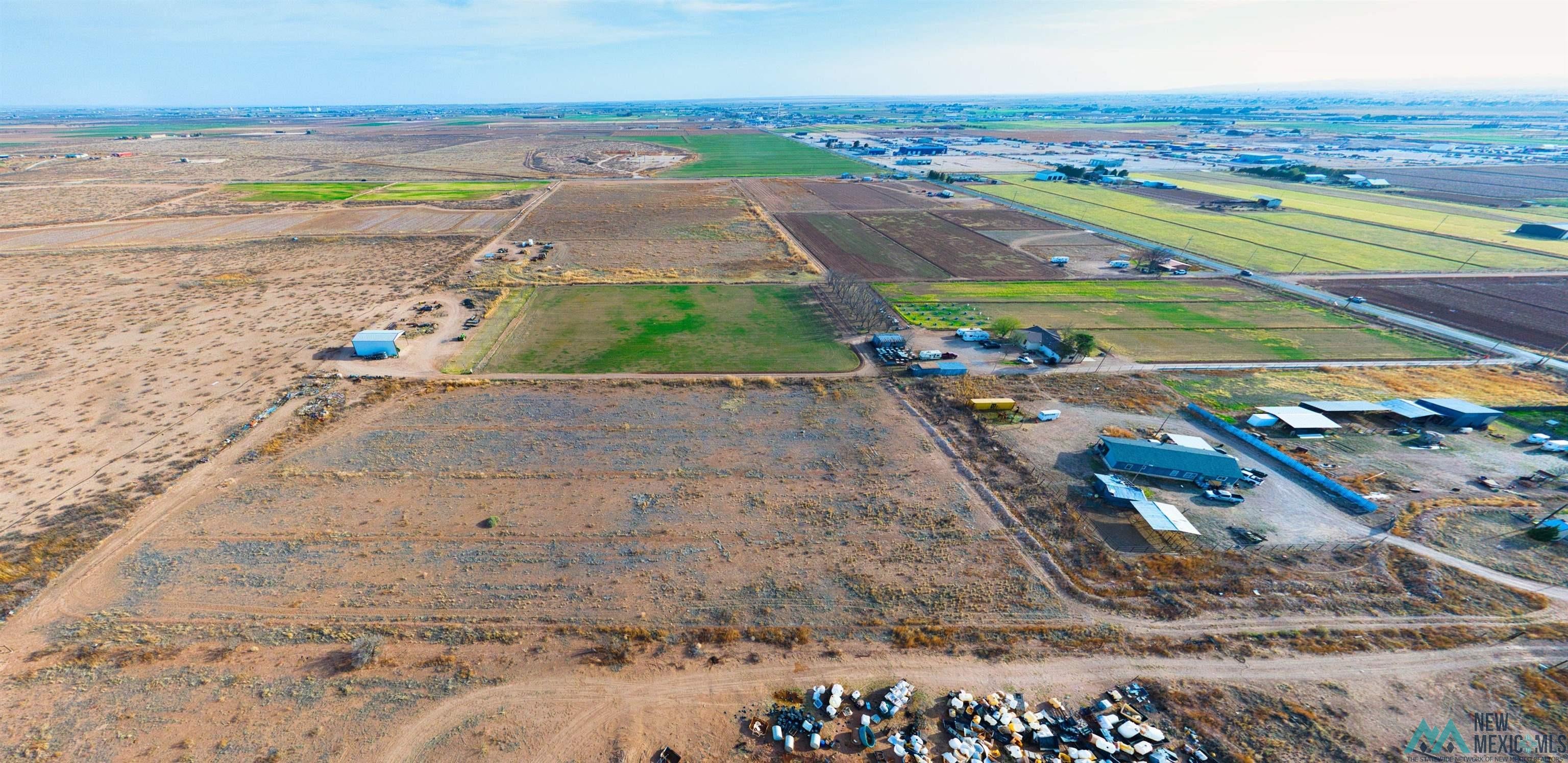 3328 Grandi Rural Road Carlsbad, NM 88220 - Photo 10 of 11 Aerial view of sparsely populated area with extensive farmland