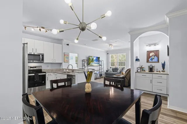a view of a dining room with furniture